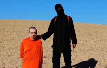 isis releases another video of beheading british pm confirms the brutal murder