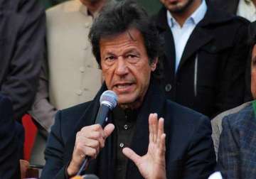 imran ends protest in pakistan capital after peshawar attack