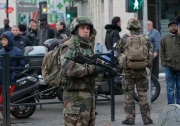 2 dead in paris shootout female suicide bomber blows herself up