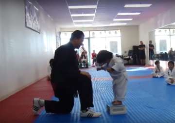 watch 3 year old boy s hilarious attempt to break taekwondo board