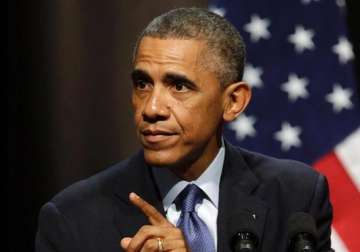 barack obama signs bill allowing congress to review iran s nuclear programme