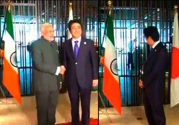 kuala lumpur pm modi fails to spot upside down tri colour shinzo abe takes notice