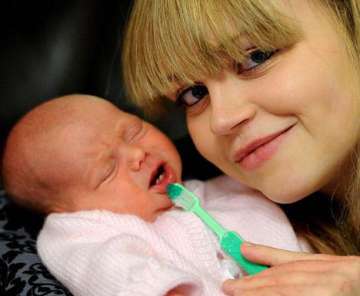 baby born with two front teeth in lancashire