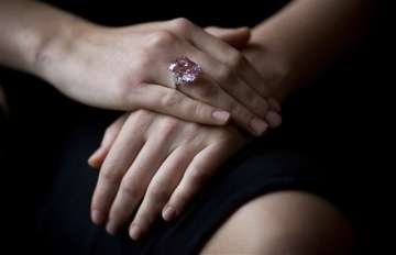 pink diamond auctioned for 23 million sets asian record