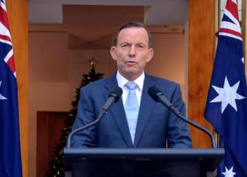 gunman in sydney hostage crisis was known to police pm tony abbott