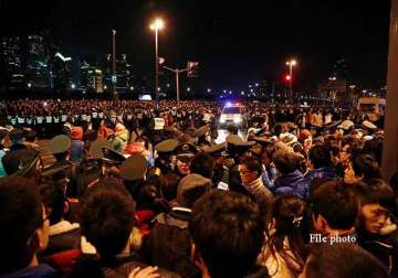 4 shanghai officials fired in deadly new year s eve stampede