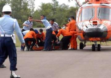 airasia crash 10 more bodies brought to hospital