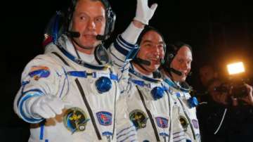 3 space station astronauts return to earth