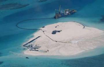 philippines warns asean over china reef reclamation