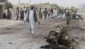 afghan police suicide bomber kills 9 in northwest