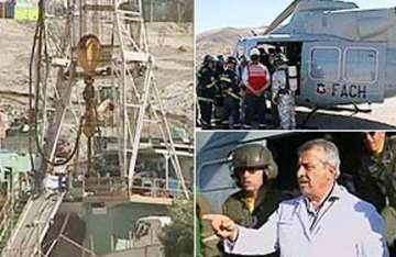 chile rescue workers conduct rehearsal to evacuate trapped miners