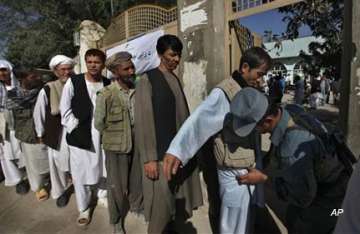 moderate polling in afghanistan under shadow of taliban gun