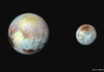 see mesmerising pluto in colour now