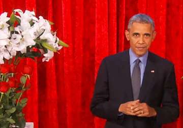 watch video barack obama woos wife michelle with valentine s day poem