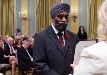 racist slur on sikh defence minister s accent rocks canadian parliament