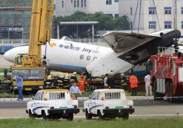 7 injured as china plane skids off runway catches fire