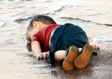 drowned syrian toddler laid to rest