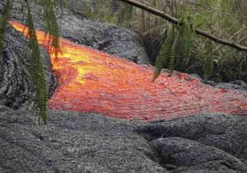 slow moving lava sets house ablaze in hawaii town