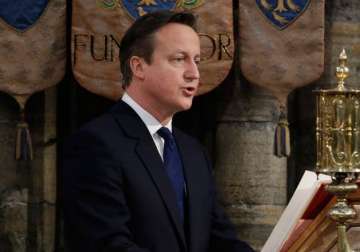 british pm david cameron names his first all conservative cabinet