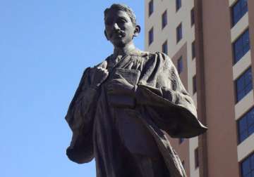 south africa mahatma gandhi statue defaced by a group of people amid racist taunts