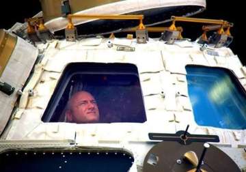 nasa astronauts scott kelly mikhail kornienko head home after a year in space