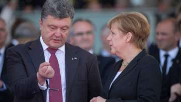 poroshenko merkel discuss ukraine situation