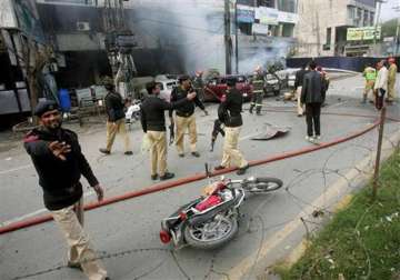 six killed in suicide bombing near lahore police headquarters