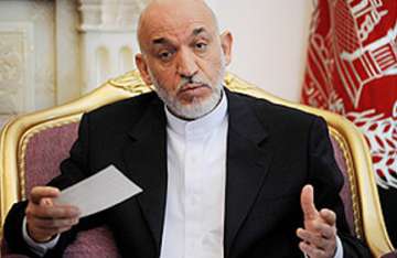 karzai confirms holding talks with taliban