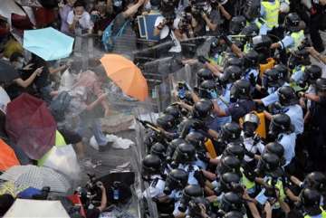 under fire hong kong leader marks national day