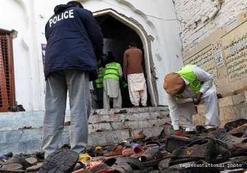 taliban militants storm shia mosque in pakistan s peshawar kill 20 injure 50