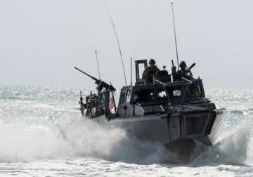 iran takes 2 us navy boats and 10 sailors into custody