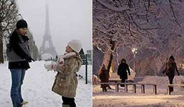 heavy snow shuts eiffel tower airport