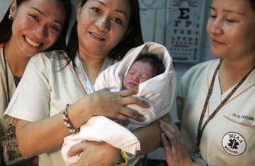 newborn boy dumped in gulf air jet toilet bin rescued in manila