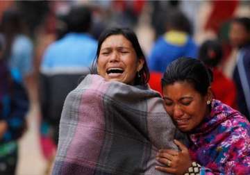 nepaldevastated death toll mounts to 3218 rain hinders rescue efforts