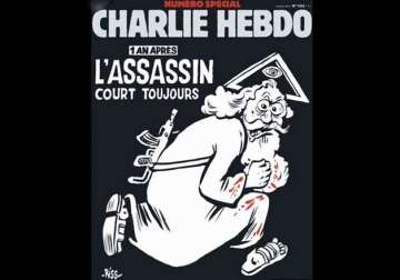 charlie hebdo s cover representing god with ak 47 is unfair vatican