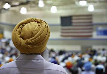 sikhs in us to hire obama s campaign managers to find acceptance