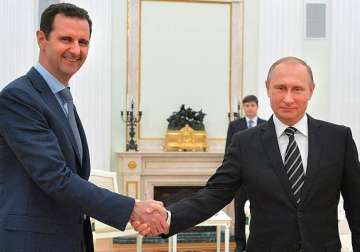 syrian president assad travels to moscow meets putin