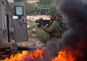 violence spreads to gaza israeli troops kill 6 palestinians