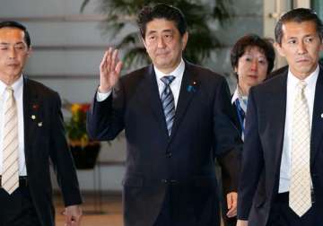 abe takes office for 3rd term as japan s leader