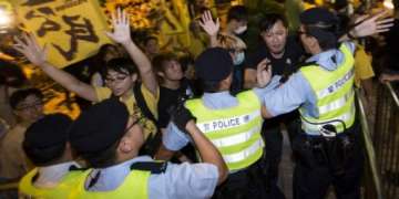 hong kong police arrest 19 at protest site