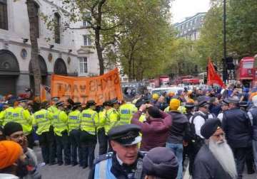 20 held as sikh protest at indian embassy in british goes violent