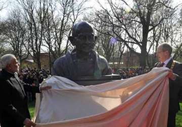 pm modi unveils bust of gandhi in german city of hanno