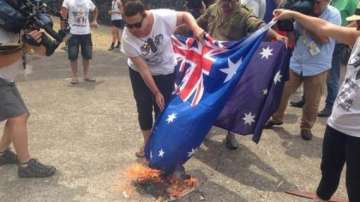 g20 summit g20 protesters burn australian flag