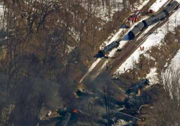 freight train carrying crude oil bursts into flames during derailment
