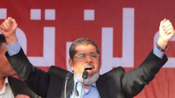 egypt s morsi asks people to continue revolution against coup