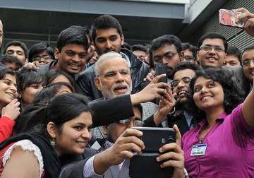 pm narendra modi clicks selfie with indian students in france