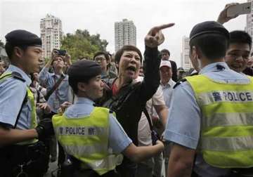 hong kong rally against chinese shoppers turns chaotic