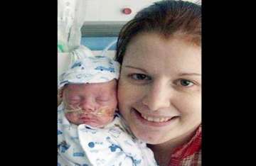 fetus kicks tumour in womb saves mom