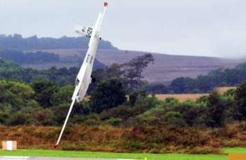 uk pilot s amazing escape as stunt glider crashes into runway
