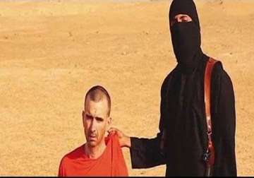 britain verifying video of aid worker s beheading